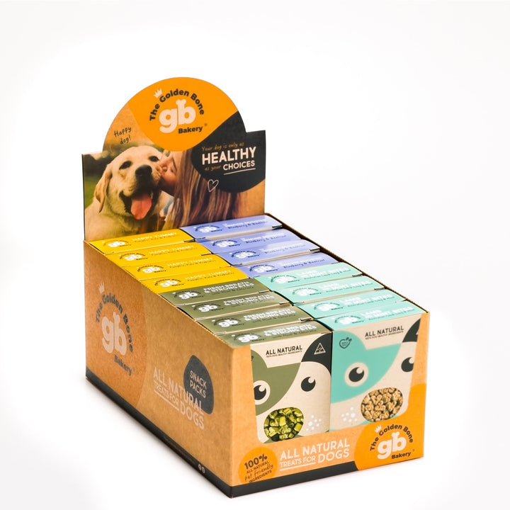 One point-of-sale cartons of 4 Flavour Selection dog treat SnackPacks by The Golden Bone Bakery, 16 x 40g packs per carton.