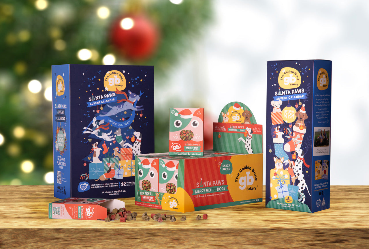 Christmas dog treat bundle with blue advent calendar and superfood treats by The Golden Bone Bakery.